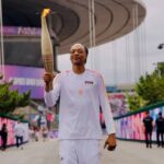 US Rapper Snoop Dogg Stars as Olympic Flame Sails into Paris