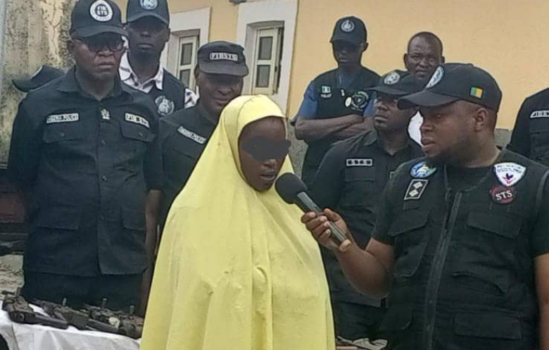 30-year-old Nigeria Woman Caught with AK-47 hidden in garri Sack Along Abuja-Kaduna Expressway