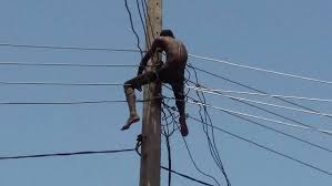 Tragedy: Police Rescue Man Who Climbed Electric Pole To Commit Suicide