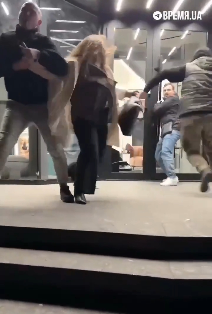 Viral Video Shows Ukrainian Woman in Tears as Husband Is Forcibly Conscribed